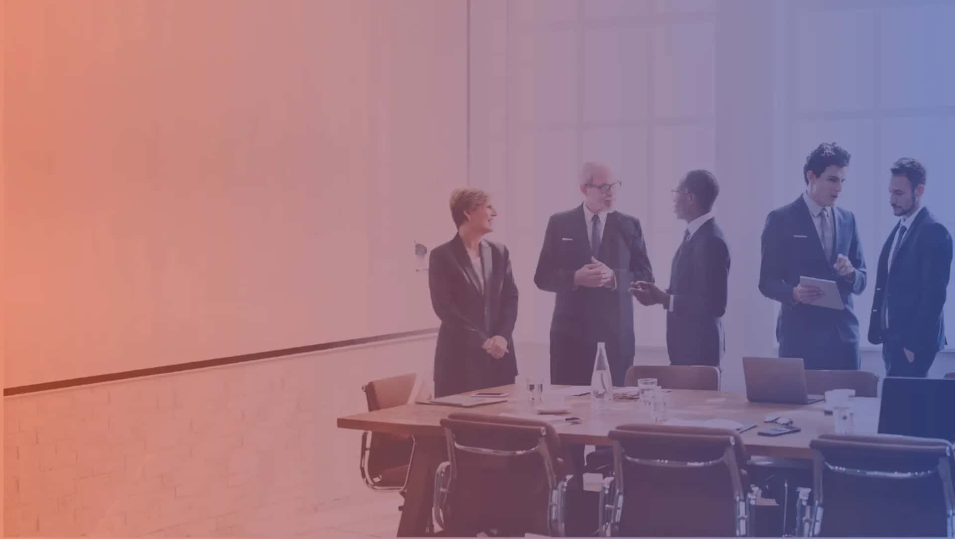 Leadership team in a boardroom discussion about a software roadmap